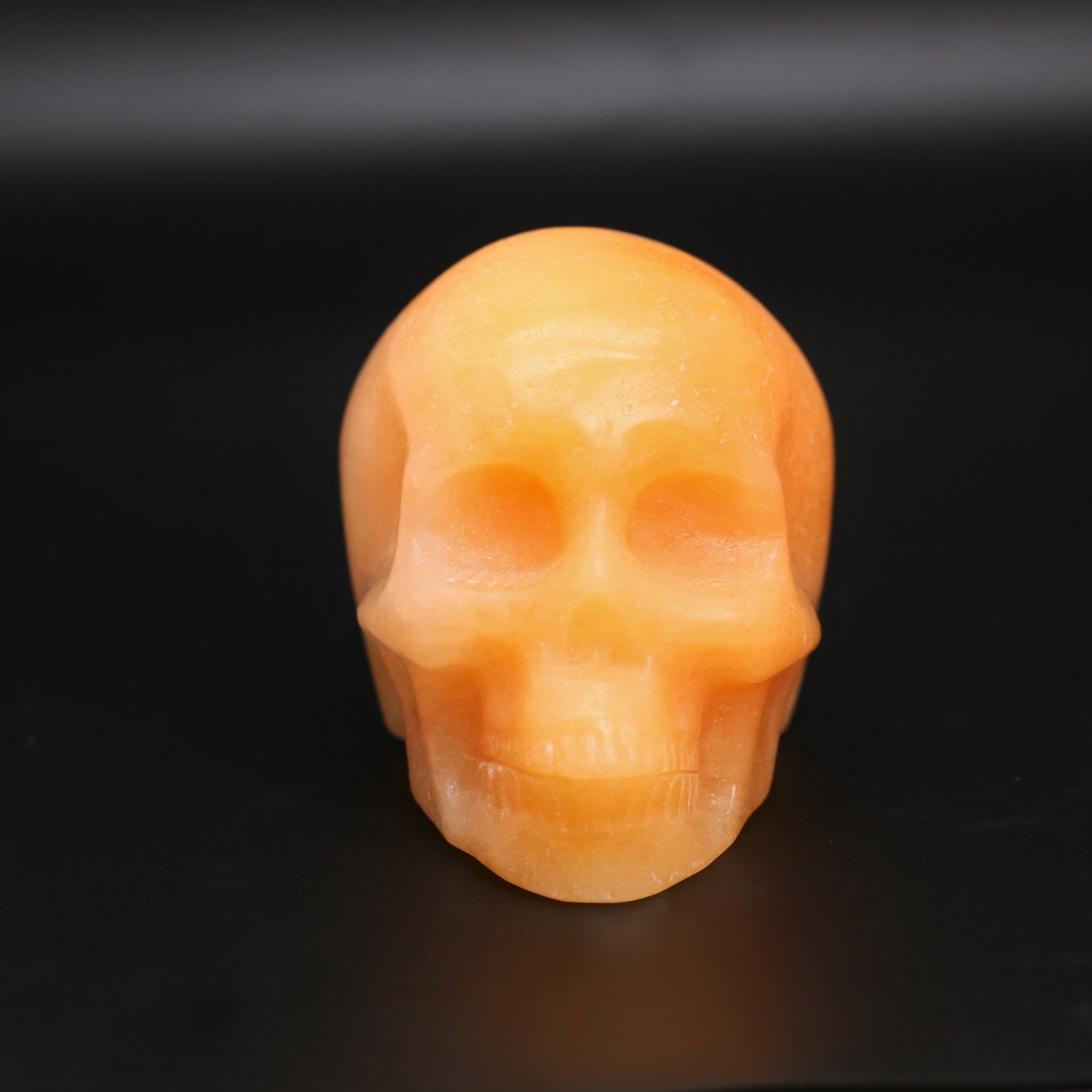 Orange calcite skull