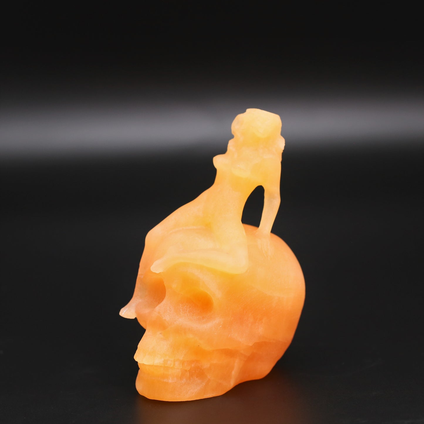 Orange calcite skull