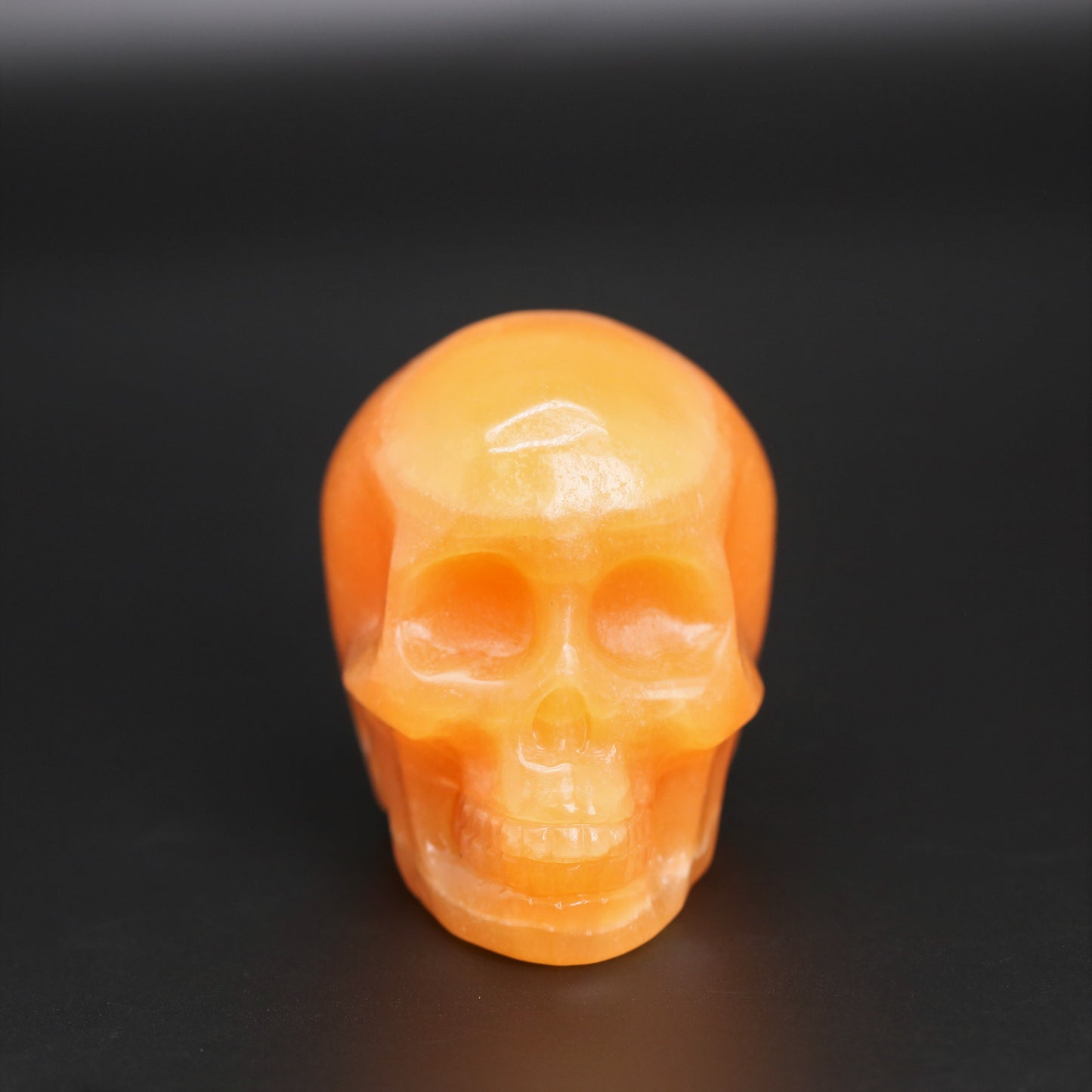 Orange calcite skull