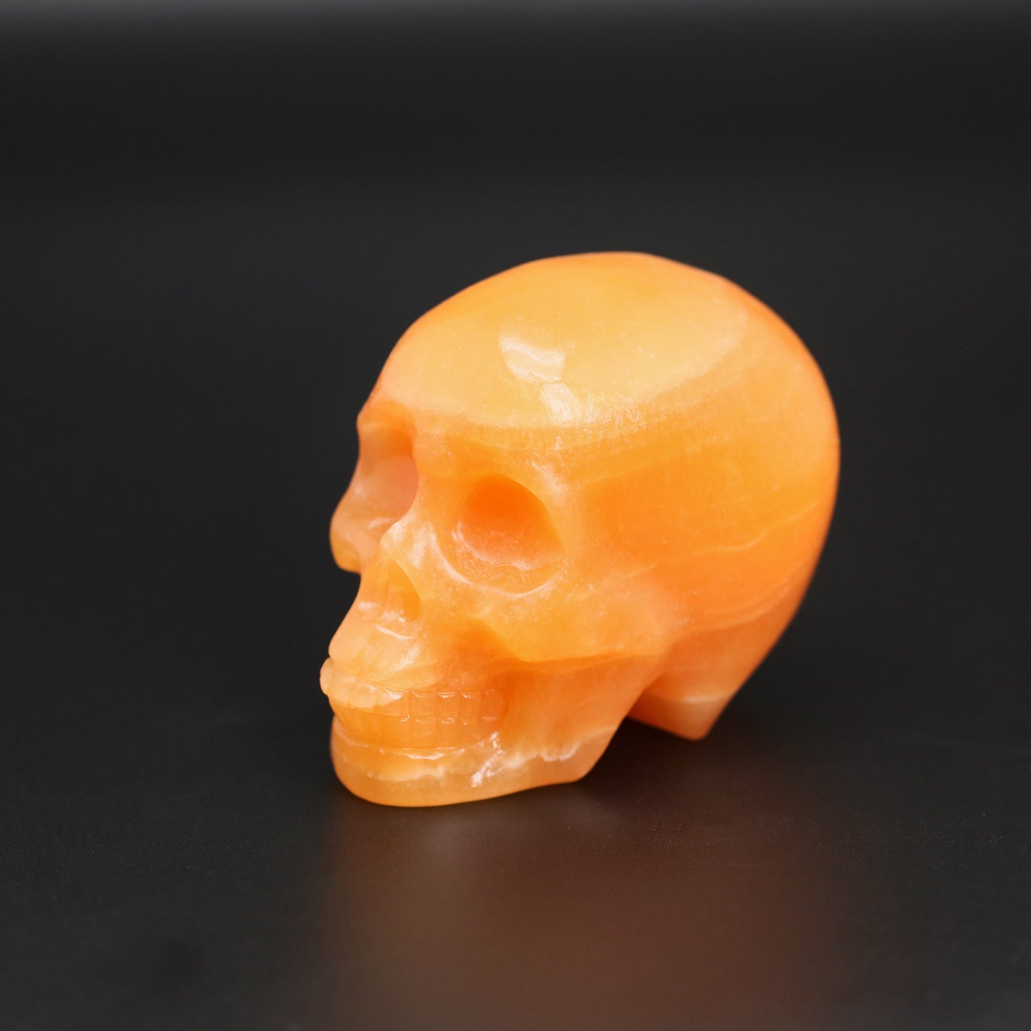 Orange calcite skull