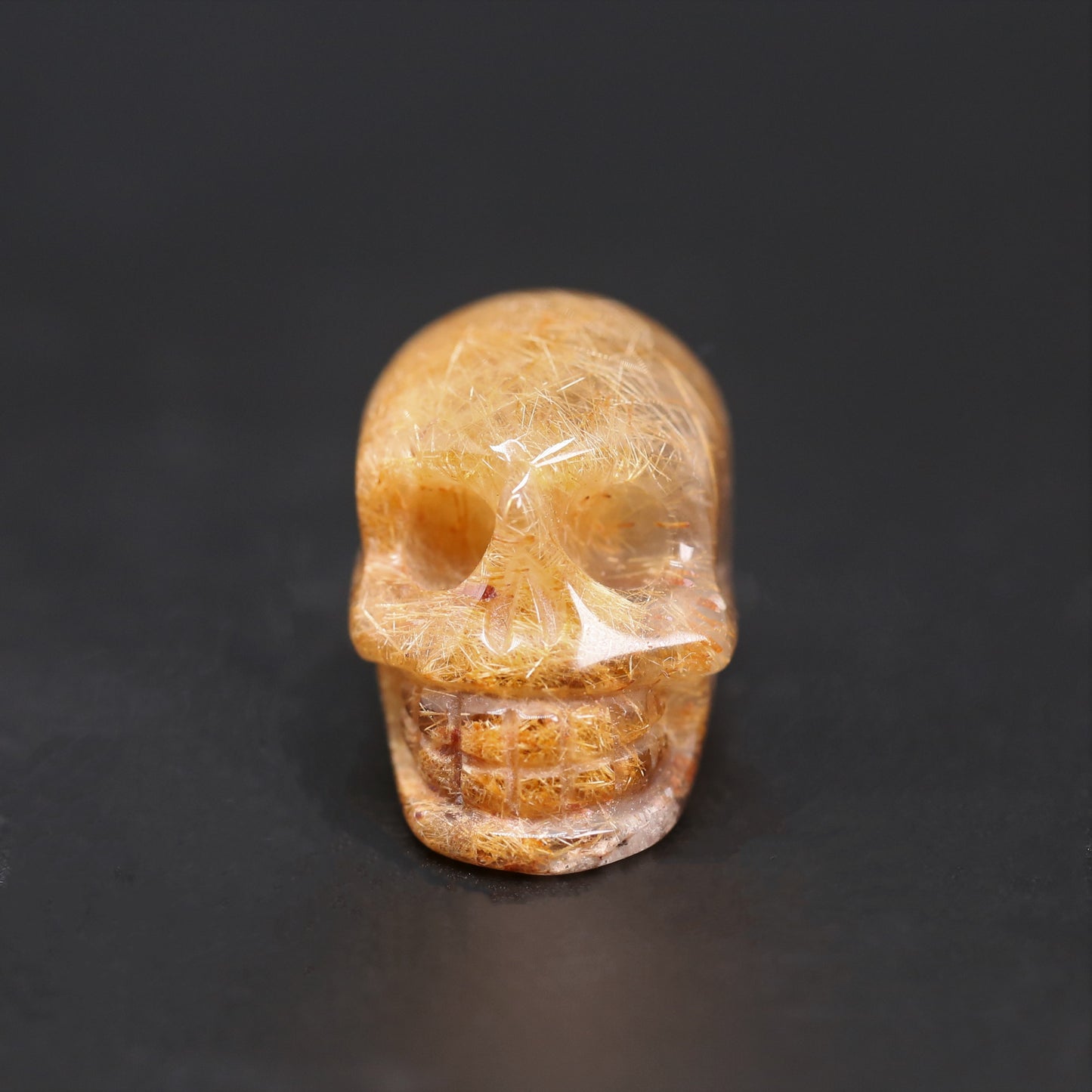 Golden rutile small skull