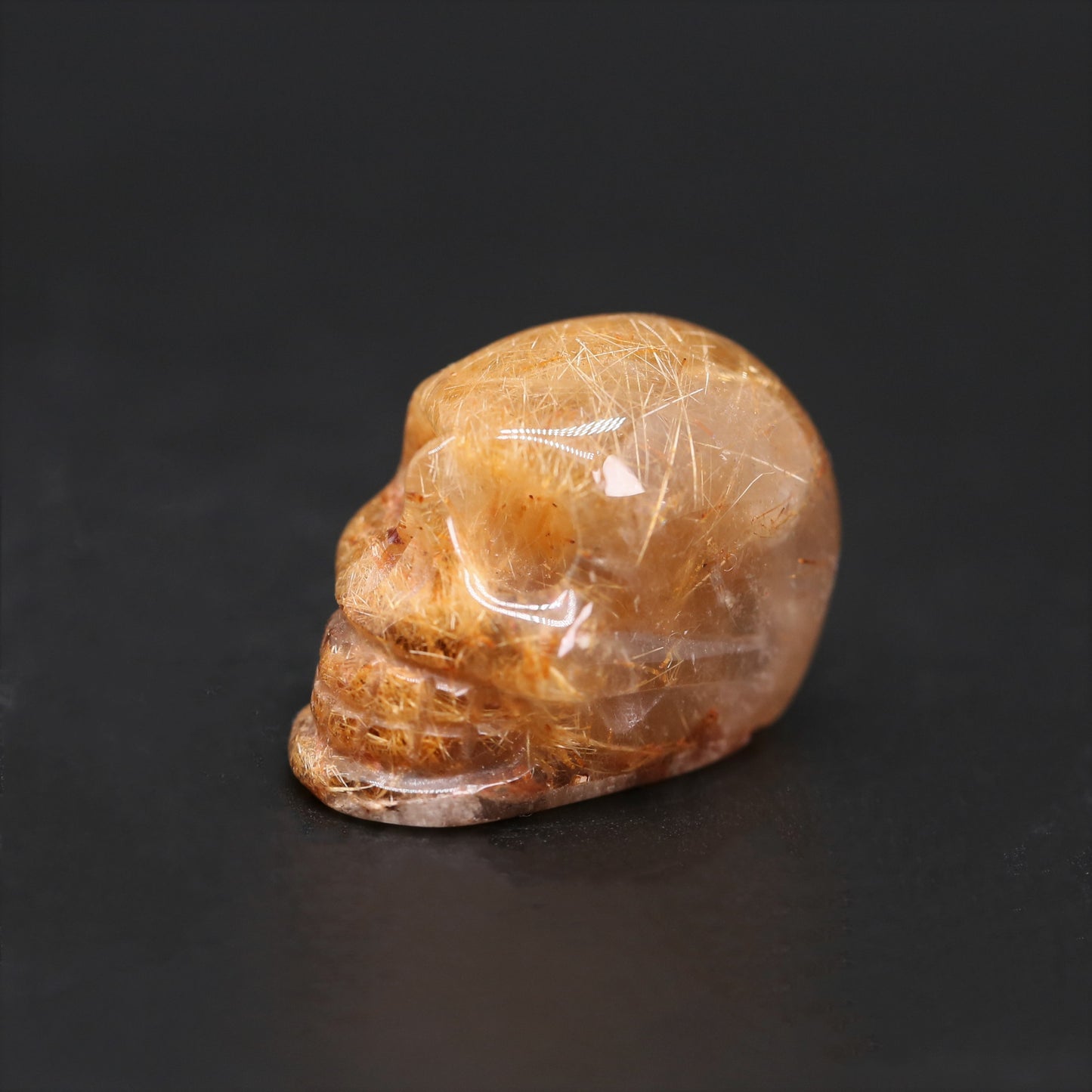 Golden rutile small skull